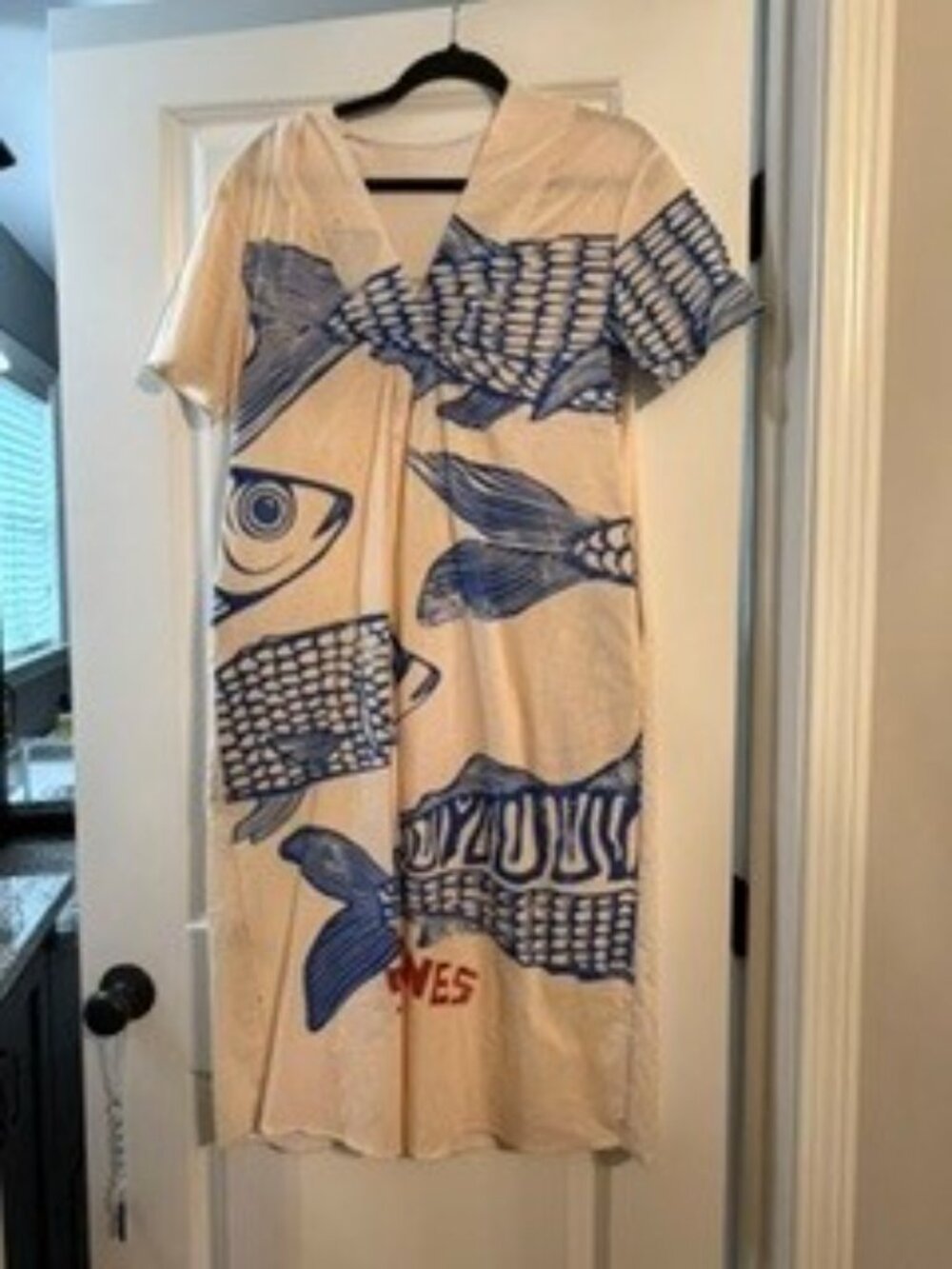 bohemian-style beach vacation dress featuring a retro blue sardine fish print